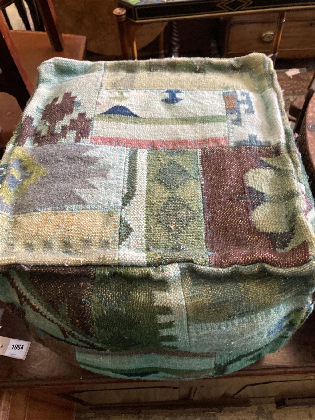 A square Kelim covered footstool, width 42cm, depth 42cm, height 40cm